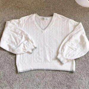 Cupcakes and Cashmere— white and silver sweater